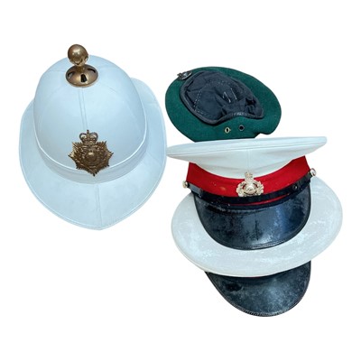 Lot 743 - Royal Marines Bandsman's helmet, together with three other Royal Marines hats and berets, (4).