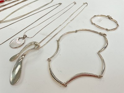 Lot 28 - Group of silver jewellery including an abstract torque necklace, other necklaces, bracelets, brooches and two white metal bangles
