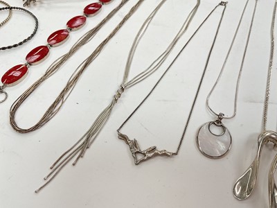 Lot 28 - Group of silver jewellery including an abstract torque necklace, other necklaces, bracelets, brooches and two white metal bangles