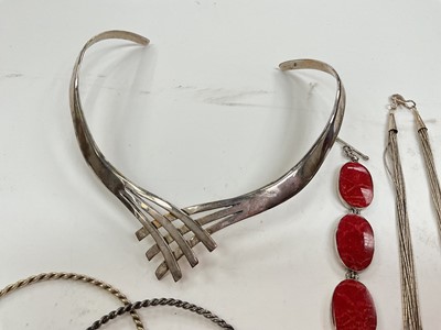 Lot 28 - Group of silver jewellery including an abstract torque necklace, other necklaces, bracelets, brooches and two white metal bangles
