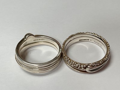 Lot 34 - Contemporary silver and 18ct gold pierced leaf design ring and two other silver rings, all the same maker EJS.