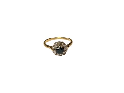 Lot 150 - Sapphire and diamond cluster ring in 18ct gold setting