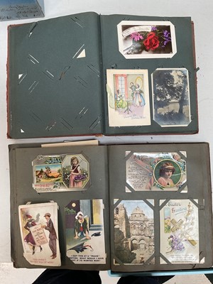 Lot 5123 - Two albums of Edwardian and later postcards