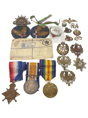 Lot 755 - First World War 1914 - 15 Star trio comprising 1914 - 15 Star, War and Victory medals named to 1591. PTE. B. Martin. Essex. Yeo. together with cloth badges and cap badges, (1 box).