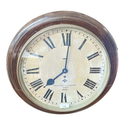 Lot 786 - Second World War mahogany British military issue wall clock, with Roman numeral dial, with broad arrow mark by Smiths English Clocks dated 1940, dial 35cm in diameter.