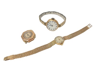 Lot 97 - 1960s 9ct gold ladies' Zenith wristwatch on integral 9ct gold mesh bracelet, 1920s 9ct gold cased ladies' wristwatch on expandable plated bracelet and a vintage 9ct gold octagonal cased watch (3)