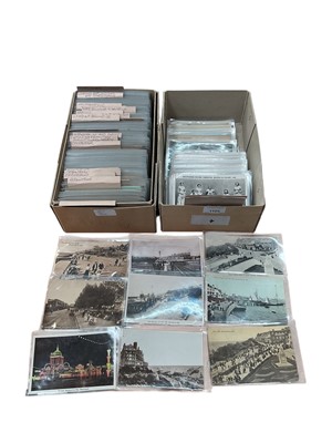 Lot 1105 - Postcard selection of Essex in 2 boxes including better real photographic street scenes, events, greetings, trams, railway etc.