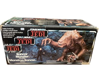 Lot 1927 - Palitoy (c1983) Star Wars Return of the Jedi Tri Logo Rancor Monster (one toe missing and tail damage), made in England, boxed (some edges taped, part graphics missing) (1)