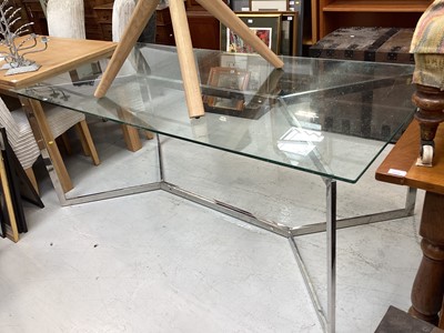 Lot 5370 - Contemporary glass and chrome dining table by Libra, purchased from Fenwick