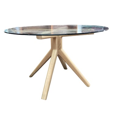 Lot 5352 - contemporary light oak and glass circular dining table, purchased from John Lewis