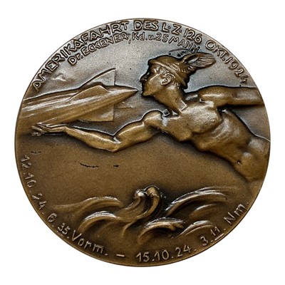 Lot 657 - Germany - A bronze medallion commemorating The America Tour by Graf Zepplin LZ - 126 12th -15th October 1924