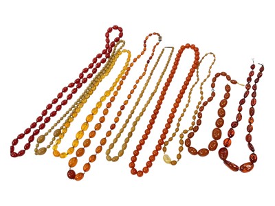 Lot 165 - Group of vintage amber and amber type polished bead necklaces