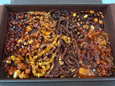 Lot 166 - Collection of amber bead necklaces including raw amber, some loose beads etc