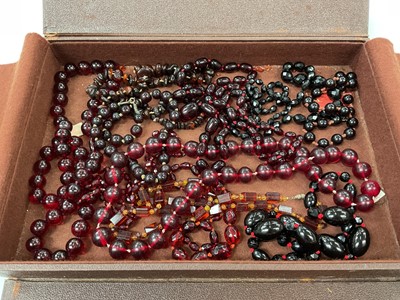 Lot 168 - Collection of vintage simulated cherry amber and similar bead necklaces