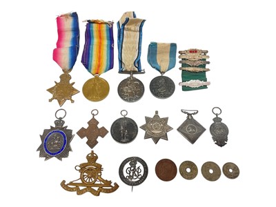Lot 758 - First World War 'Mons Star' trio comprising 1914 Star named to 50713 GNR. R. T. Sinfield. R.F.A., War and Victory medals named to 50713 GNR. R. T. Sinfield. R.A. together with a silver War badge...