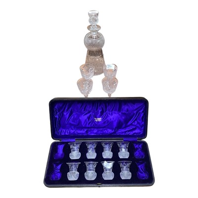 Lot 5045 - Antique cut and etched glass thistle shape whisky decanter, set of 8 matching dram glasses in fitted box retailed by Mackay and Chisholm of Edinburgh and four Victorian cut glass port glasses