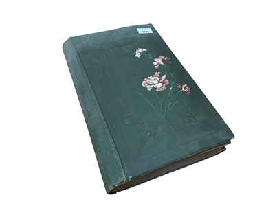 Lot 1138 - Vintage floral album of comic postcards, Bamforth, Trow etc. Approx 120
