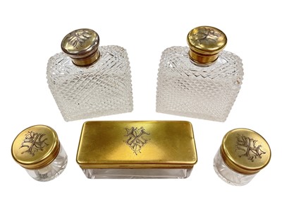 Lot 175 - Set of five Victorian silver gilt topped glass dressing table items