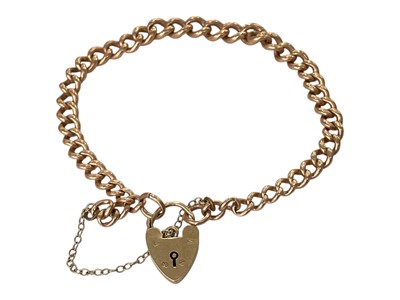 Lot 190 - 9ct gold curb link bracelet with padlock clasp