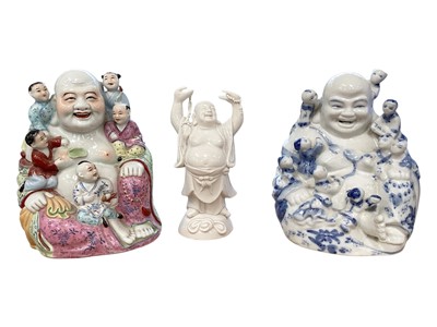 Lot 2279 - Three porcelain early 20th Century Bhudda figures
