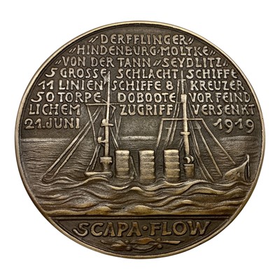 Lot 666 - Germany - A bronze medallion commemorating The Scuttling of The High Seas Fleet at Scapa Flow, Rev: Depicts a sinking ship 1919 (Dia: 97mm) (1 medallion)
