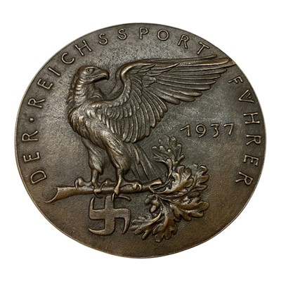 Lot 667 - Germany - A large bronze medallion commemorating Hans Von Tschammer Und Osten (The Reichs Sports Leader) Obv: Bust of Sport's Leader facing left. Rev: Eagle on oak branch, swastika below 1937 by...