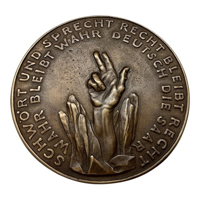 Lot 668 - Germany - A large bronze medallion commemorating The Reunion of The Saar Basin with Germany, Rev: Depicts a miner swearing an oath to Germania 13.1.1935 by K. Goetz (Dia: 114mm) (1 medallion)