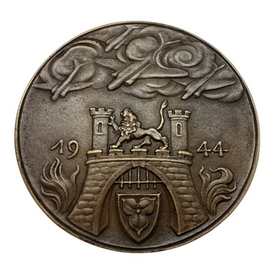Lot 677 - Germany - A large bronze medallion commemorating The Destruction of Lebiniz-Haus in Hanover, Obv: Depicts building on fire, whilst reverse shows Allied Bombers attacking a castle surmounted by a...