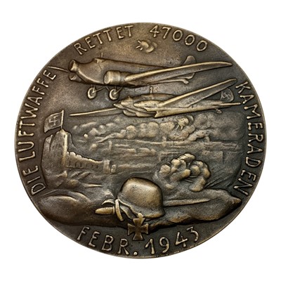 Lot 681 - Germany - A large bronze medallion commemorating The Rescue of 47,000 German soldiers from Stalingrad, Obv: Depicts evacuating airplanes over a burning city Feb 1943 by K. Goetz (Dia: 111mm) (1...