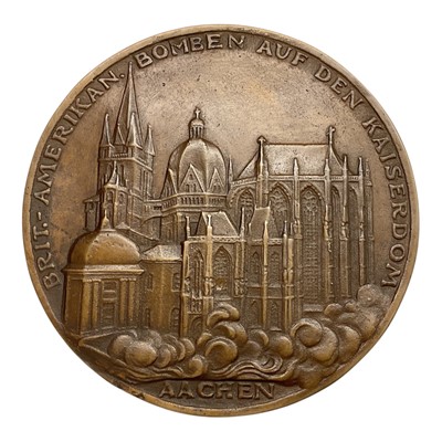 Lot 684 - Germany - A large bronze medallion commemorating The Destruction of Aachen Cathedral by Allied Bomber, Obv: Depicts a city view whilst the reverse a skeletal figure carrying a scythe etc. 23 Dec...
