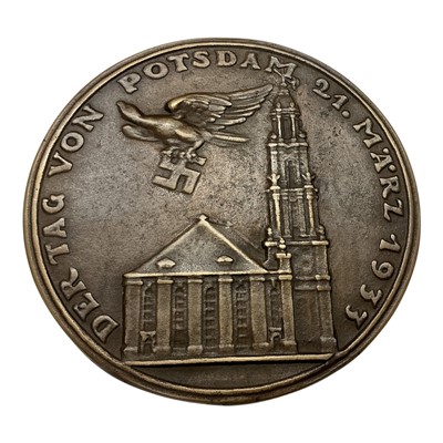 Lot 685 - Germany - A large bronze medallion commemorating A Ceremony for The Reopening of the Reichstag - following a fire 'Potsdam Day' 21 March 1933, Obv: Depicts Hitler & Hindenburg shaking hands...