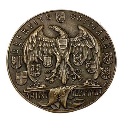 Lot 687 - Germany - A large bronze medallion commemorating The German Austrian Anschluss ' The Annexation of Austria into Nazi Germany' 13 March 1938, Obv: Depicts a map of Germany & Austria with rais...