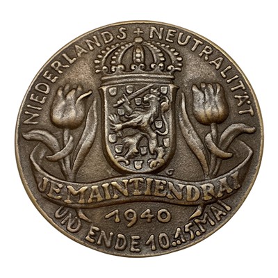 Lot 587 - Germany - A bronze satirical medallion mocking Dutch neutrality prior to the Nazi invasion of The Netherlands 'The Flying Dutchmen' 10-15 May 1940 by K. Goetz (Dia: 69mm) (1 medallion)