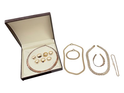 Lot 223 - Group of silver gilt jewellery to include three colour woven necklace and matching bracelet, fringe-style necklace, other chains and various gem set dress rings