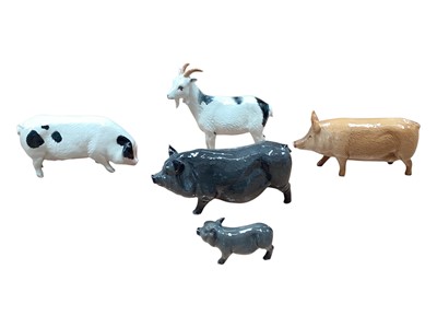 Lot 2267 - Four Royal Doulton animals including Pigs and a Goat