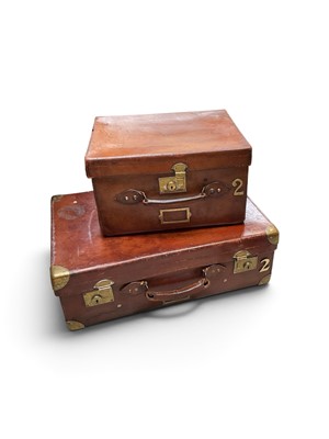 Lot 5075 - Two vintage brown leather suitcases with brass fittings