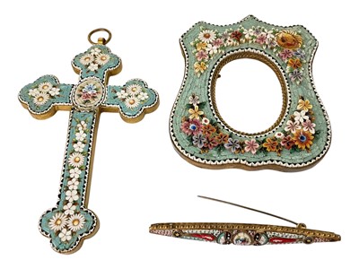 Lot 197 - Antique Italian micro-mosaic gilt metal mounted cross pendant and photograph frame with floral decoration on blue ground, together with a similar brooch (3)