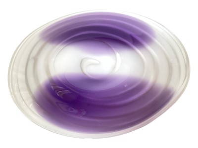 Lot 2276 - Stylish art glass plate with spiral purple and white decoration, signed V. Gibovskis, 51cm x 45cm