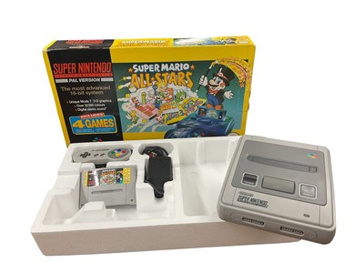 Lot 2714 - Boxed Super Nintendo Entertainment System Pal Version Super Mario All Stars