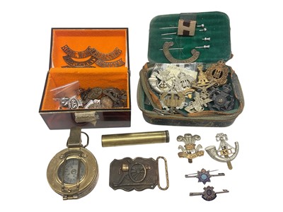 Lot 788 - Second World War British Military MK IX Prismatic Compass by F. Barker & Son Ltd, dated 1939, together with a good collection of cap badges and other military badges.