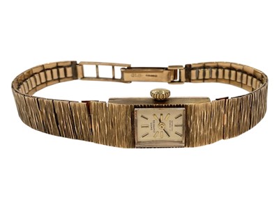 Lot 946 - Vintage 9ct gold ladies Swiss Empress wristwatch with integral 9ct gold bark effect bracelet