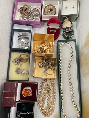Lot 945 - Group of silver jewellery including an amber ring, other gem set rings, silver bead necklace, various charms and other costume jewellery