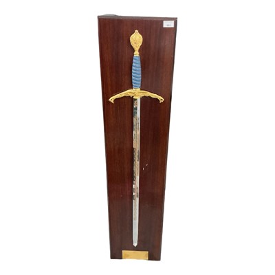 Lot 863 - Wilkinson 'Peace' sword made in 1995 to commemorate the 50th anniversary of the end of the Second World War, mounted on wooden backing with brass plaque.
