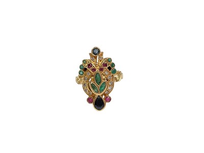 Lot 277 - Indian yellow metal diamond and multi gem set ring, marked 750, size N