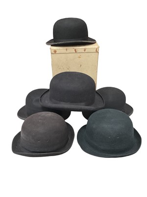 Lot 2602 - Vintage hats including four black bowler hats, two Christys' Pathfinder hats and a 1958 naval hat.