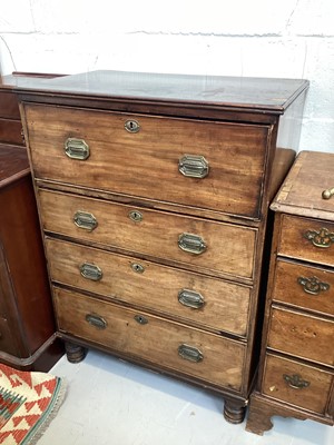 Lot 5367 - 19th century mahogany secretarie chest with fitted upper drawer above three drawers below, brass handles, on turned feet