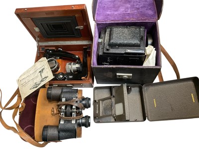 Lot 5205 - 1930s Zeiss Ikon photograph Special Reproduction Apparatus with instructions in mahogany box, an 'Ensign-Special' Reflex camera in case, an Aldis photograph magnifier and a spiral of binoculars...