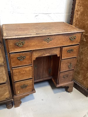 Lot 5368 - George III oak kneehole desk with brass handles