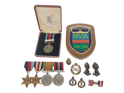 Lot 824 - Second World War medal group comprising 1939 - 1945 Star, France and Germany Star, Defence and War medals (mounted on bar), together with a Royal Mint Normandy Campaign unofficial medal and rela...