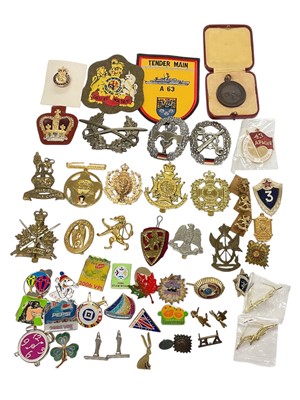 Lot 825 - Group of Soviet, British and other military badges.